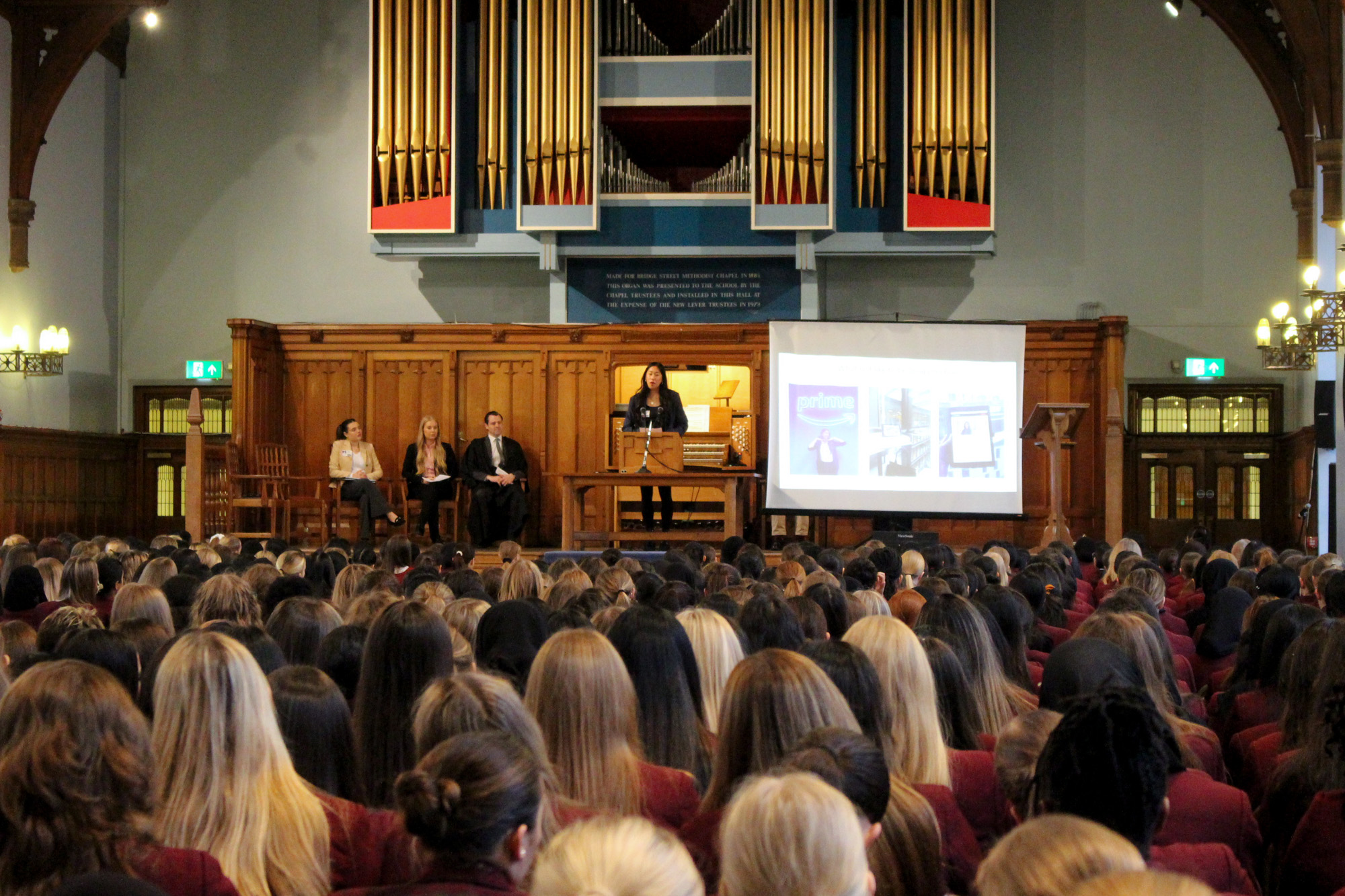 Jasmine speaking in Girls' Division assembly