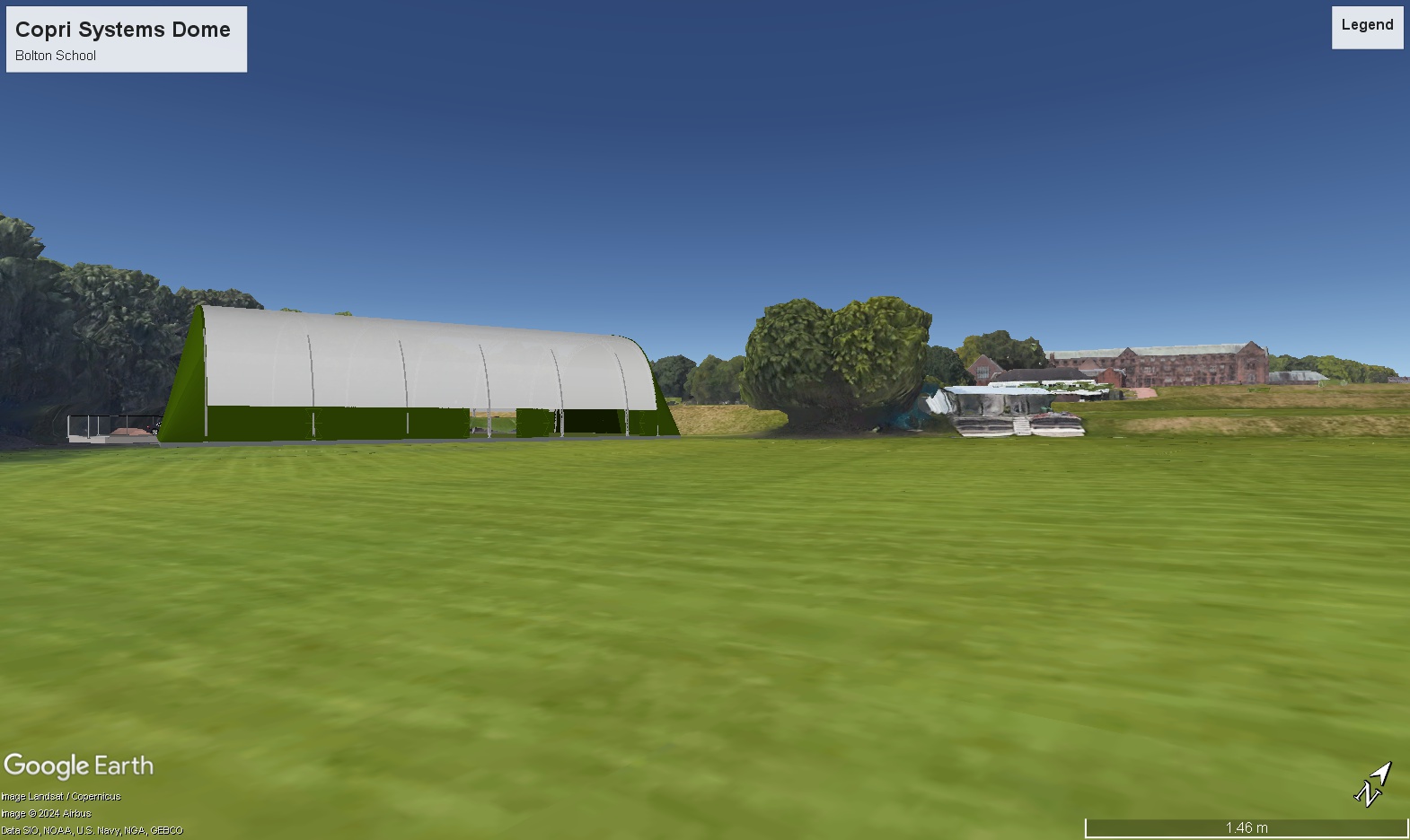 Google Earth visual showing the Sports Dome as it will be seen from the bottom of the school fields, near to the cricket pavilion and with the red sandstone school buildings visible in the background