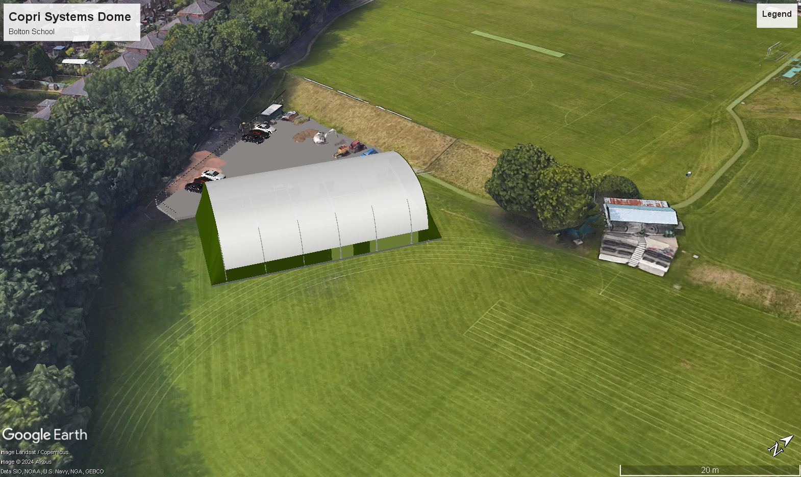 Aerial 3D visualisation of the Sports Dome overlaid on a Google Earth image of Bolton School's sports fields, showing the car park and cricket pavilion nearby