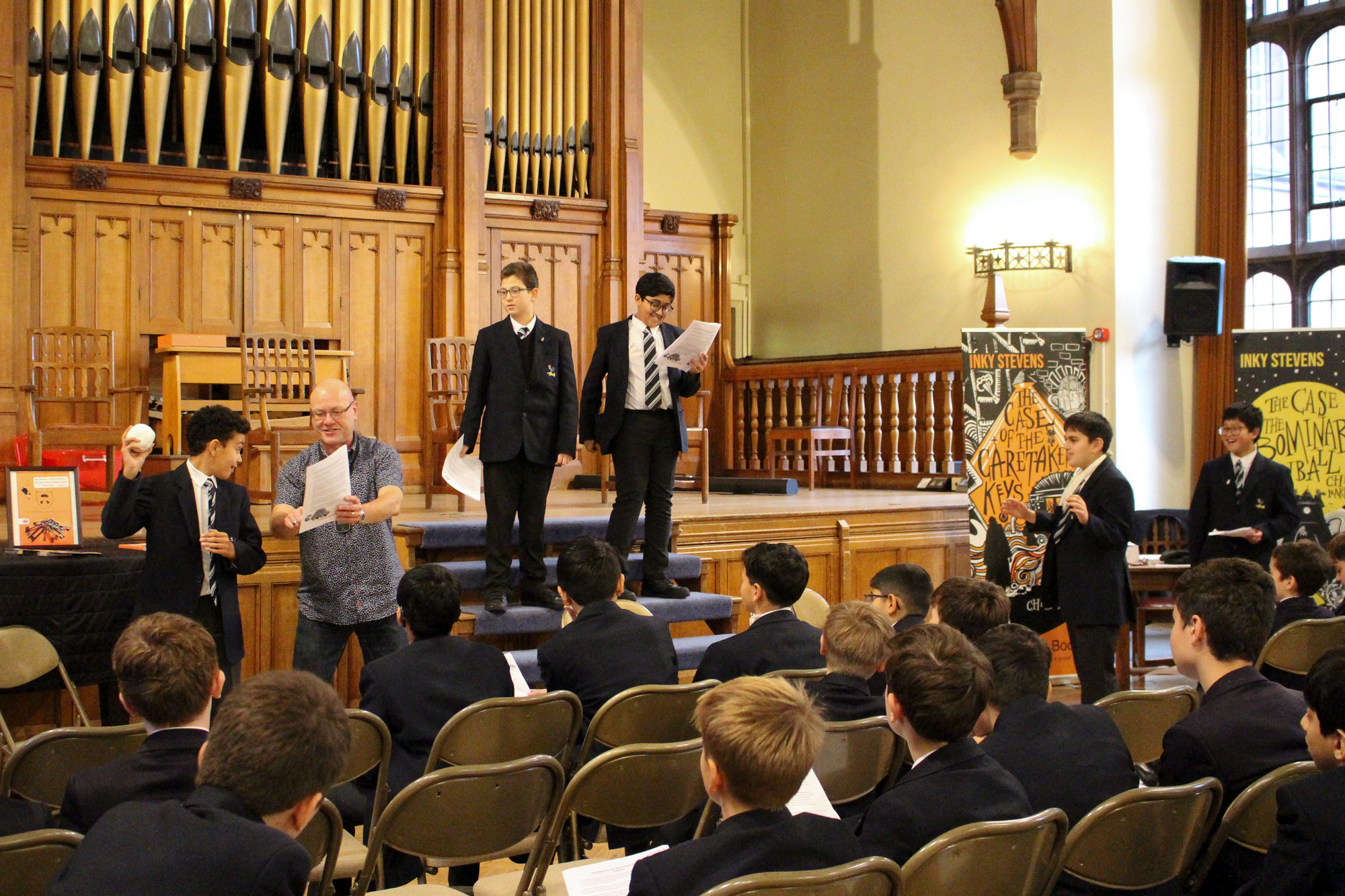 Author Chris Martin and Boys' Division pupils acting out a scene from 'The Case of the Abominable Snowball'