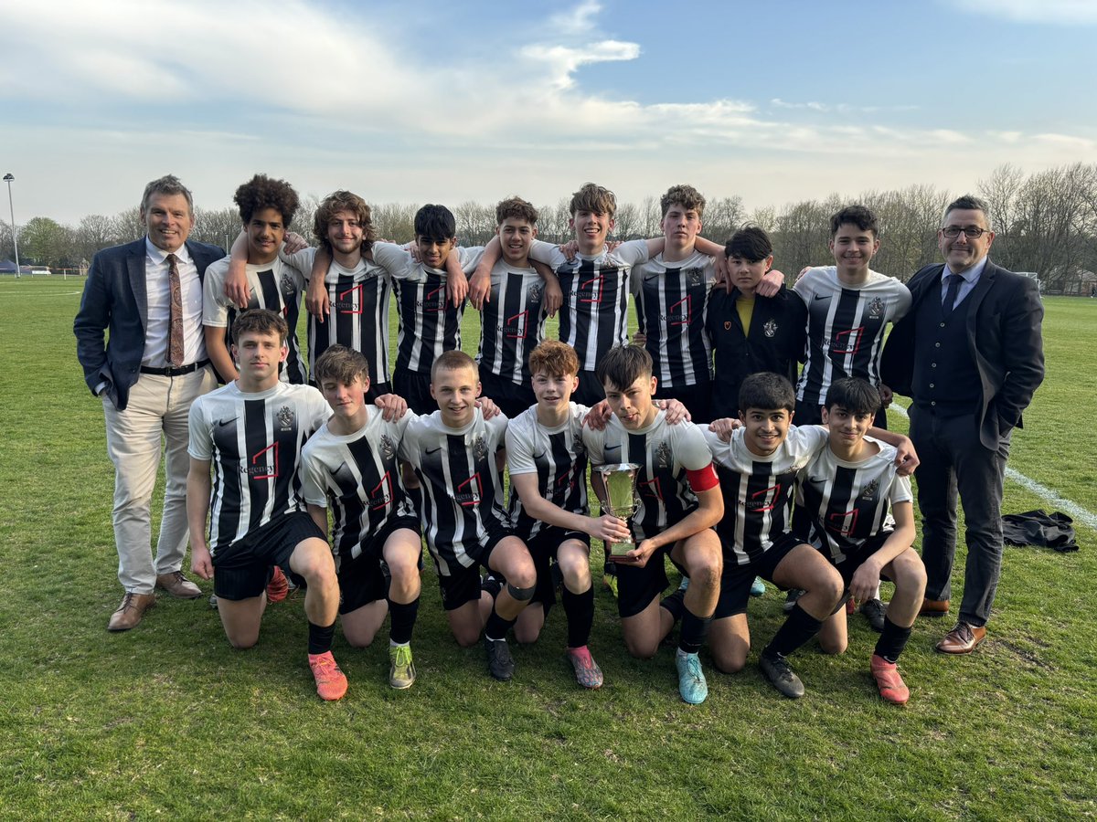 The Bolton School Boys' Division Year 10 Football Team with the Town Cup