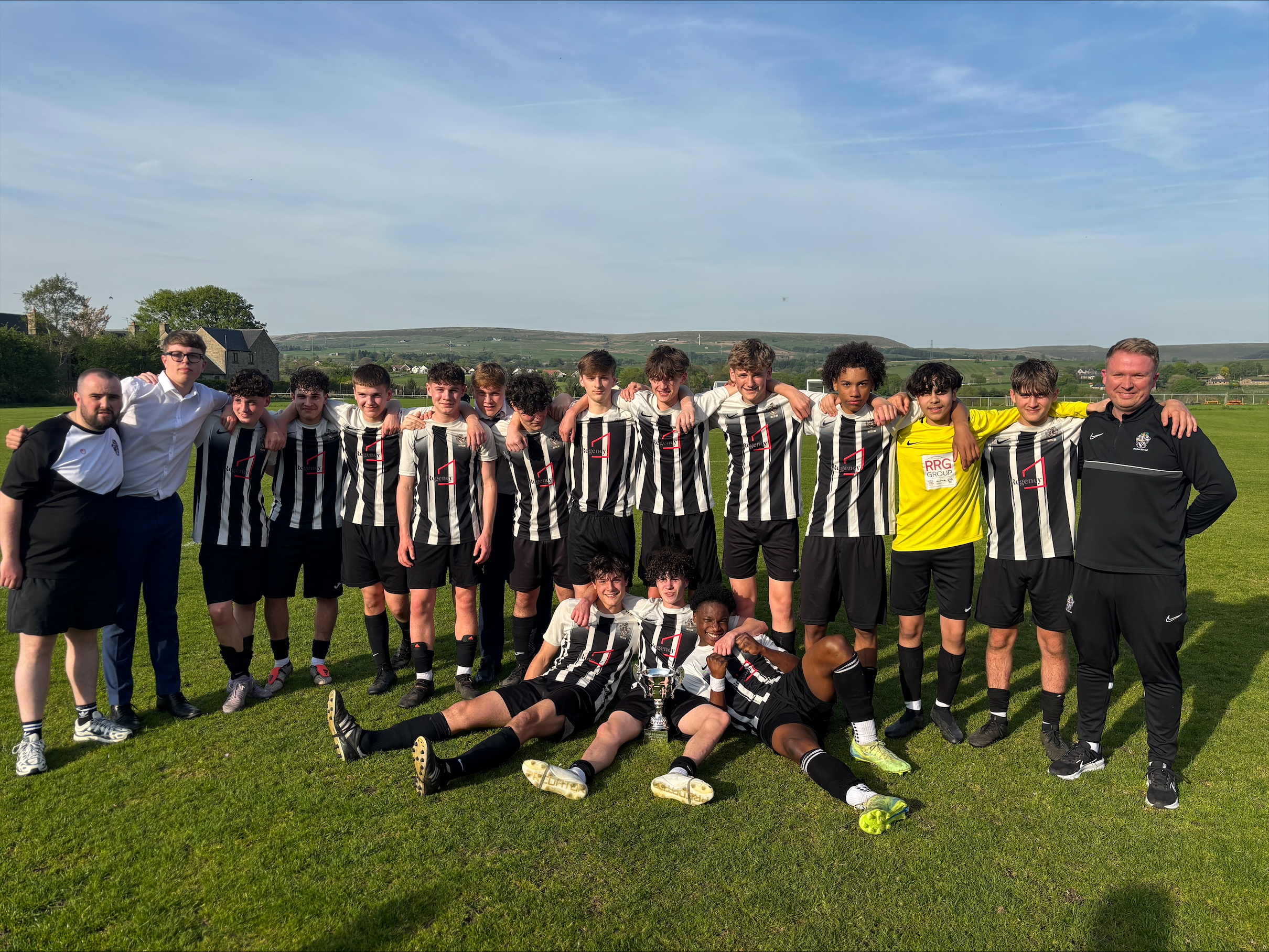 The Bolton School Boys' Division Year 11 Football Team with the Town Cup