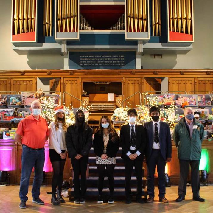 Girls Gift Toys to Bolton Lions' Xmas Appeal