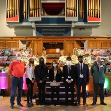 Girls Gift Toys to Bolton Lions' Xmas Appeal